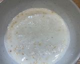 A picture of step 1 of Porridge with blueberries and strawberry jam.