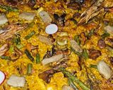 Foto del paso 9 de la receta: Arroz con camagroc, secreto, alcachofas..