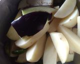 A picture of step 1 of Folui fish curry with vegetable.