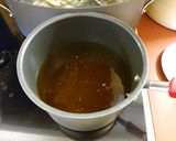 A picture of step 1 of Lee's Bread and Butter Squash Pickles.