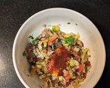 A picture of step 5 of Mexican quinoa salsa in cucumber pockets.
