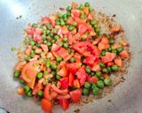 A picture of step 3 of Matar wala baingan ka bharta without onion.