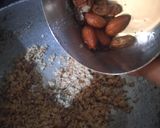 A picture of step 4 of Rava coconut burfi cardamom flavour.
