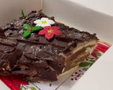 Foto del paso 12 de la receta: Tronco de Navidad 🎄🎁 relleno de nata y praliné de avellanas y chocolate sin lactosa