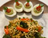 A picture of step 2 of Maggie Noodles with egg and vegetables.Avocado Deviled Eggs.