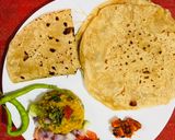 A picture of step 3 of Masoor Dal Bharta with North Indian Style Chapati and Chatpata Mango Pickle.
