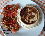 Foto del paso 5 de la receta: Tartita rellena de atún, arvejas, zapallito, zanahoria y queso