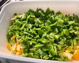 Une image de l'étape 10 de Courgettes jaunes, tomate noire et poivrons verts aux épices.