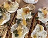 Une image de l'étape 1 de Tartines chaudes chèvre, miel à la truffe et romarin.