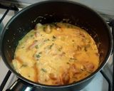 Foto del paso 3 de la receta: Papas rústicas con cheddar panceta y verdeo