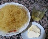 A picture of step 1 of Kunafa and Qashtalia Decorated with Oranges, Strawberries, and Bananas.