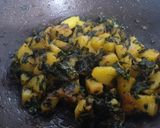 A picture of step 4 of Aloo methi with methi laccha paratha.