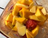 A picture of step 1 of Mango and watermelon juice.