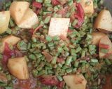 A picture of step 3 of Sem phali with Aloo.