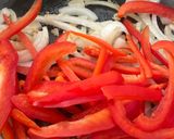 A picture of step 4 of Kielbasa with Bell peppers and Cabbage 🥬🫑.