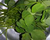 A picture of step 2 of Alo palak maithi.