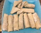 A picture of step 6 of Samosa/spring rolls wrap.