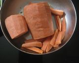 A picture of step 1 of Cucumber boondi raita.