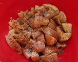 A picture of step 2 of Crispy Roasted Seasoned Potatoes.