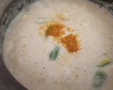 A picture of step 5 of Nawabi Paneer Korma in white Gravy.