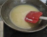 A picture of step 3 of Rajasthani ghevar with white chocolate ganache.