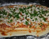 Foto del paso 4 de la receta: Pizza en rollo