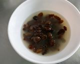 Une image de l'étape 2 de Taboulé aux tomates, légumes, raisins, herbes et épices.