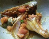 A picture of step 2 of Fish head curry with tomato.