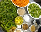 A picture of step 1 of Green Garlic And Fresh Haldi Instant Pickle.