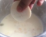 A picture of step 4 of Rasmalai topping with kesari Rabri.