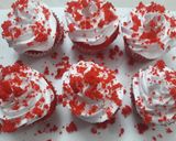 A picture of step 4 of Red cup cakes with chocolate center.