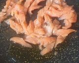 A picture of step 1 of Fusilli with salmon and cream.