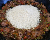 Foto del paso 2 de la receta: Arroz negro con calamar y rape