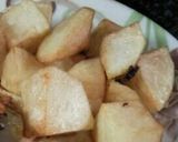 A picture of step 9 of Stuff eggplant with potato.