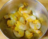 A picture of step 1 of Kochu Pata Chingri.