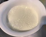 Une image de l'étape 9 de Gratin de pommes de terre façon dauphinoise à l'ail confit et deux fromages.