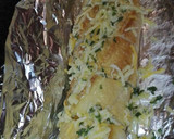 Foto del paso 4 de la receta: Barra rellena de pechuga queso gratinada con ajo perejil y cuatro quesos