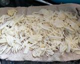 A picture of step 1 of Potato Lachha.