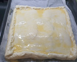 Foto del paso 4 de la receta: Pastel de hojaldre de jamón y queso fácil