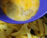 Foto del paso 3 de la receta: Huevos rotos con pico de gallo