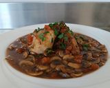 A picture of step 11 of Chicken sauté chasseur.