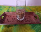 A picture of step 8 of Chikoo Thandai.