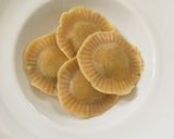 A picture of step 19 of Orange flavour sweet & sour soup with besan ravioli.
