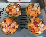 Une image de l'étape 13 de Melon farci aux tomates bicolores, feta, radis et menthe fraîche.