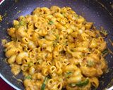 A picture of step 13 of Creamy Cheesy Schezwan Pasta.