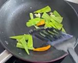 A picture of step 2 of Pan Seared Salmon Butter With Stir fried Veggies.
