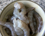 Foto del paso 1 de la receta: Arroz con langostinos y calamares