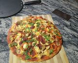 A picture of step 11 of Cheesy chicken pizza.