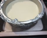 A picture of step 5 of Rich Cheesecake with Homemade Cookie Crust.