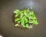 A picture of step 1 of Curry Patta Chicken (Chicken with curry leaves).